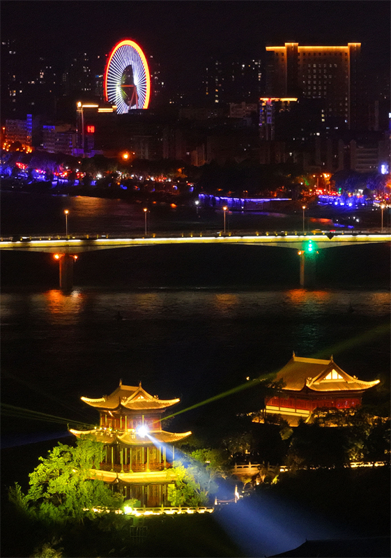2024年9月7日，湖南省衡阳市石鼓书院在多彩的灯光映照下与城市夜色交相辉映，流光溢彩、美轮美奂（无人机照片）。曹正平摄