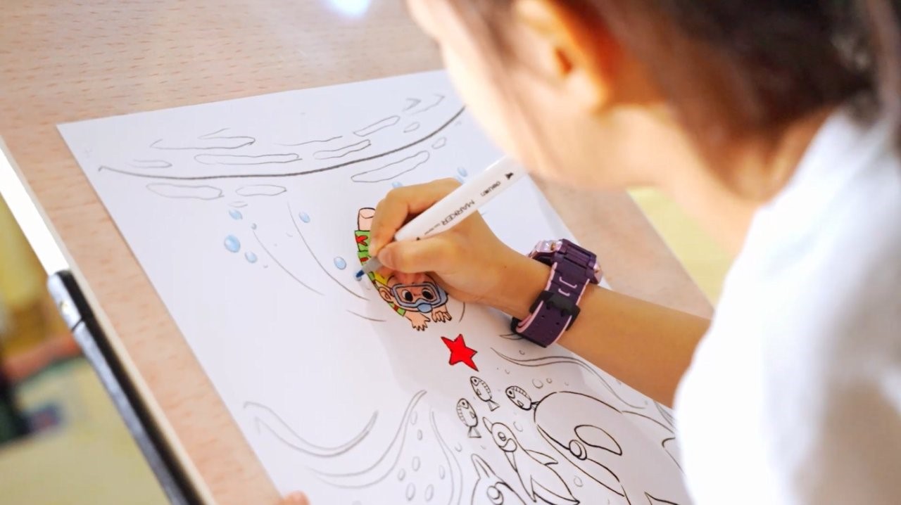 少年兒童在創作。單位供圖