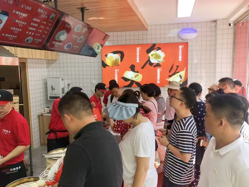 沙田包子品牌店火爆的銷售情況。受訪單位供圖